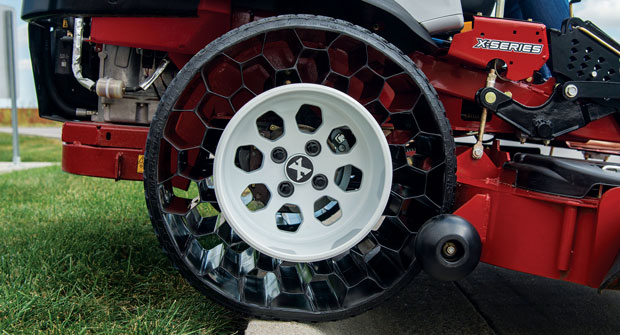 MORE MOW TIME Airless radial tires help eliminate downtime on mowers and reduce many maintenance costs. (Photo: Exmark)