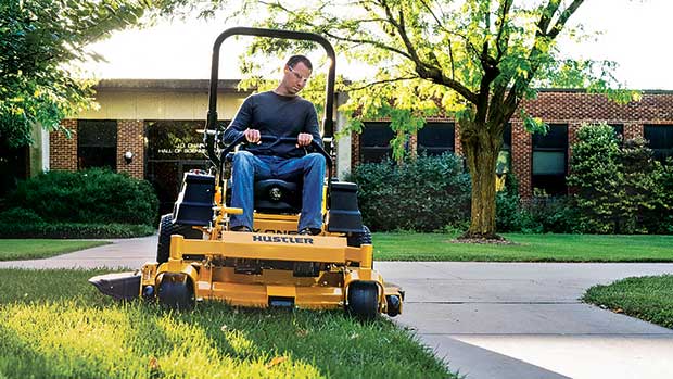 Get it done: Zero-turn mowers can cover a lot of ground and are often used on large complexes. (Photo: Hustler)