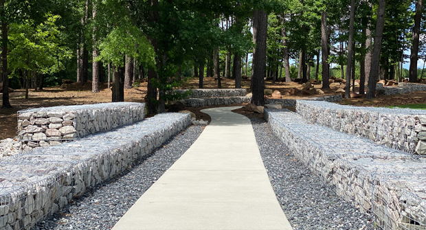 This Gabion retaining wall creates a point of interest on the campus. (Photo: Tyner Tew)